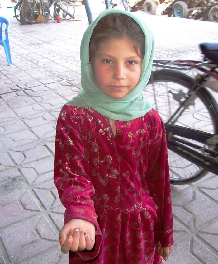 Afghan Girl in Red Dress